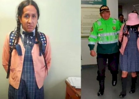 Vestido de mulher, homem entra em banheiro feminino de escola